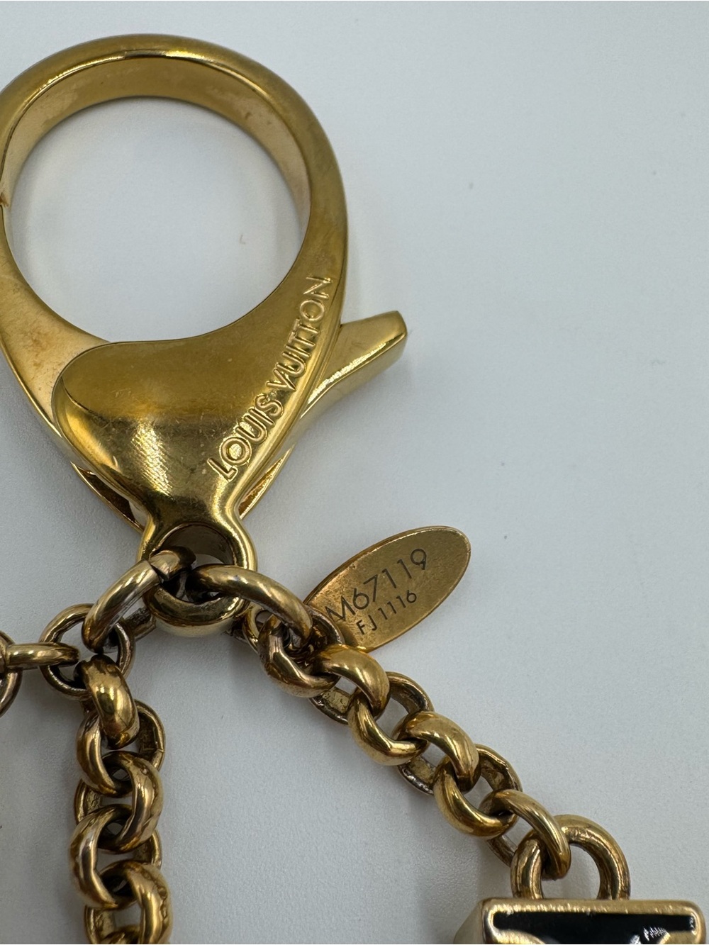 Louis Vuitton Fleur De Bag Charm in Gold Tone with Blush, Purple, and Black - Picture 8 of 8